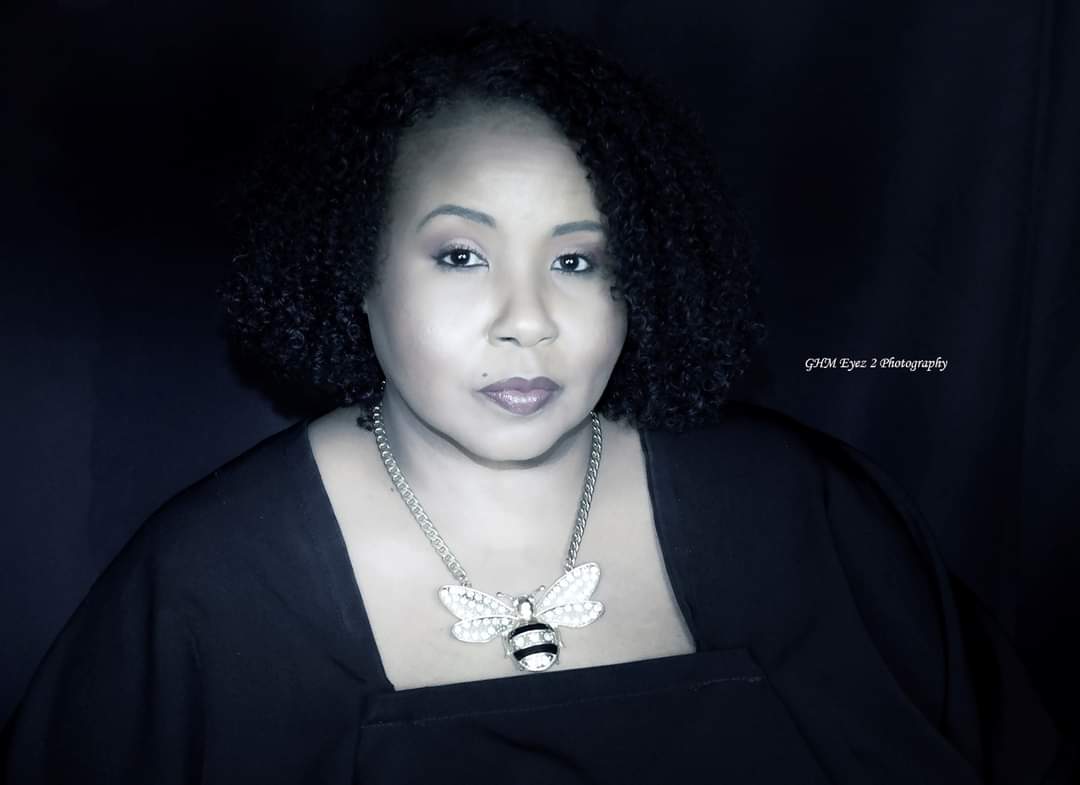 Expressive monochrome portrait against a dark background